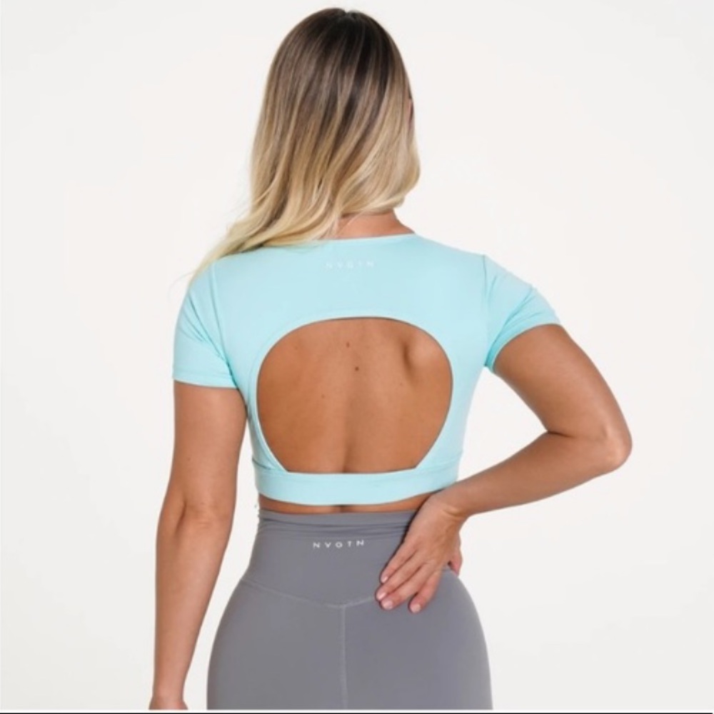 NVGTN open back crop top in teal/light blue sz M